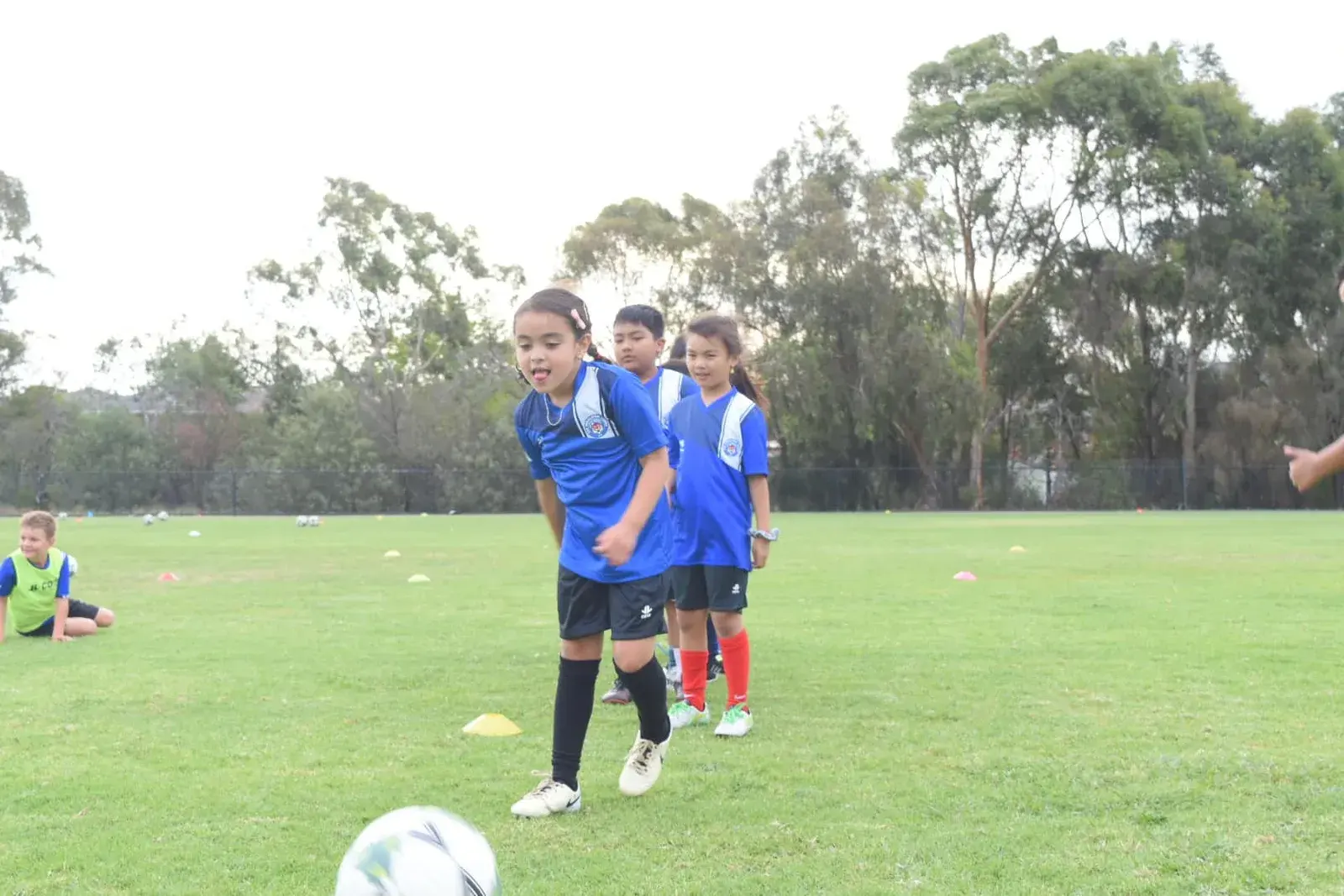 Young players lining up for a football drill