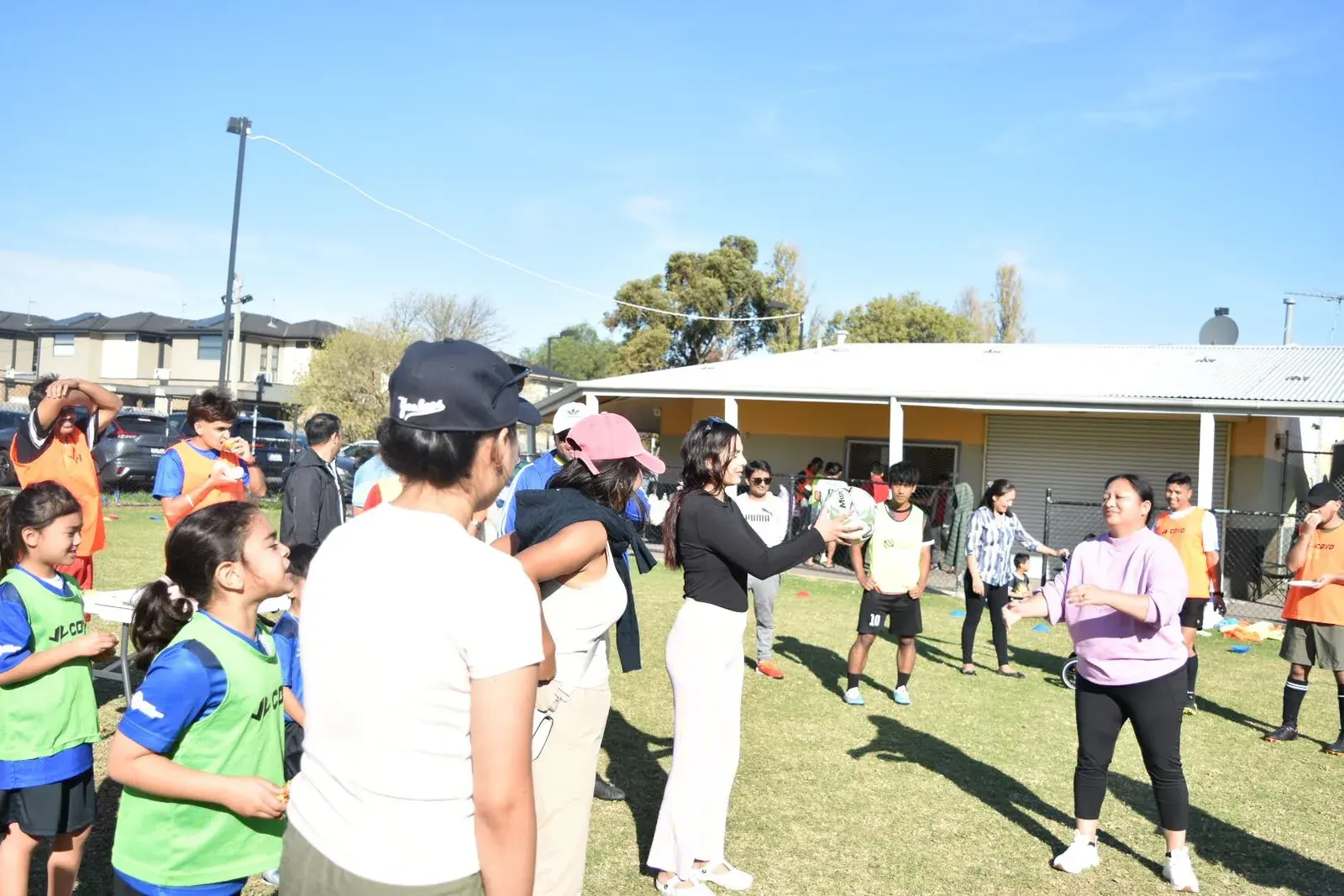 Club families gathering for an outdoor game