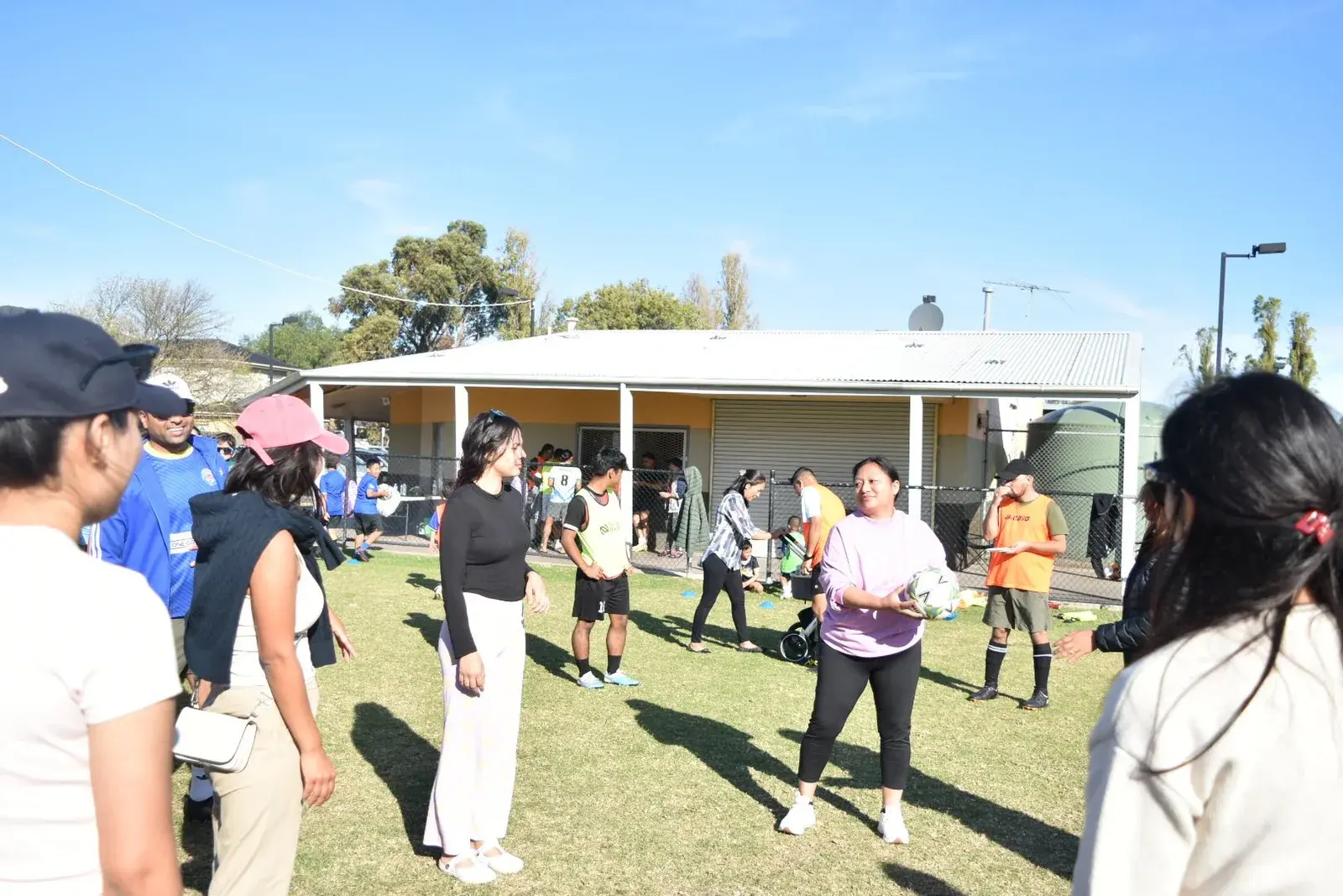 Families taking part in a group activity