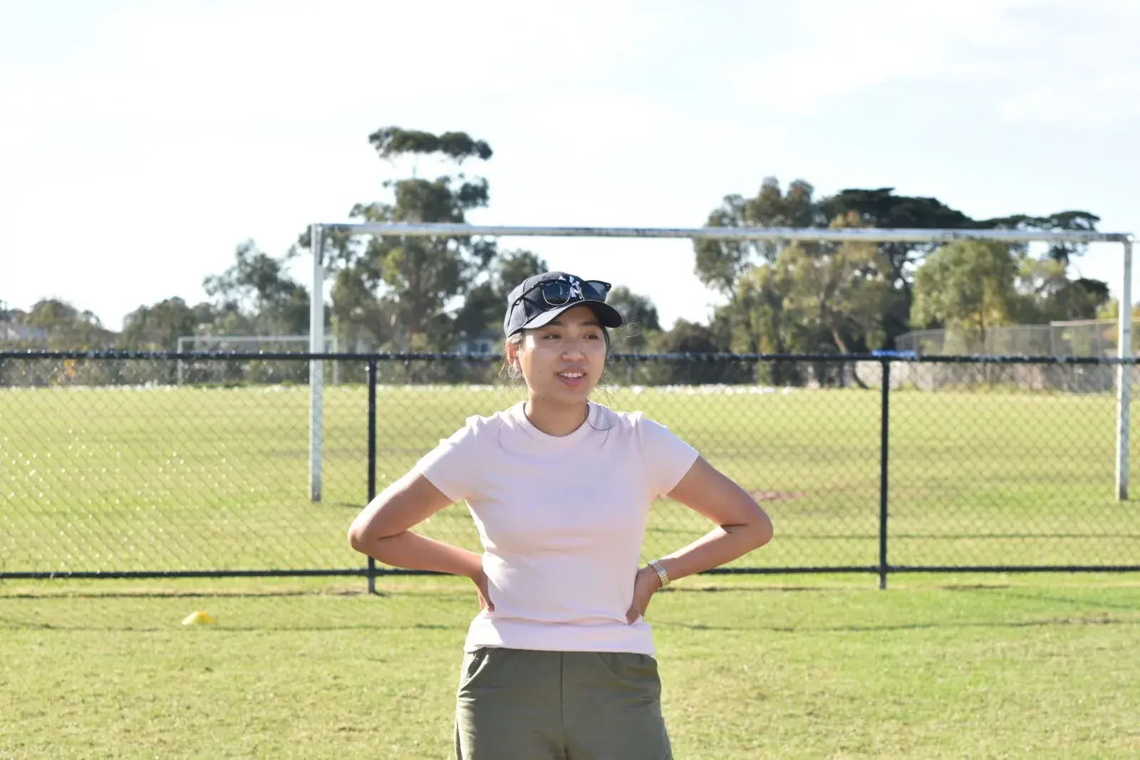 Participant in a pink shirt on the field