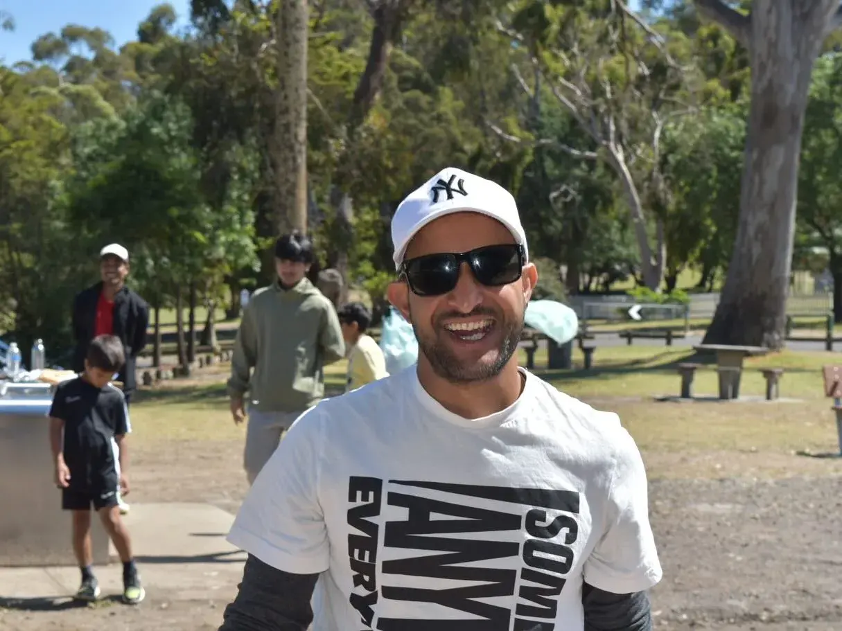 Club member smiling at the barbecue