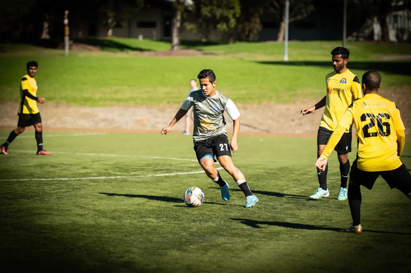 Players competing during an evening match