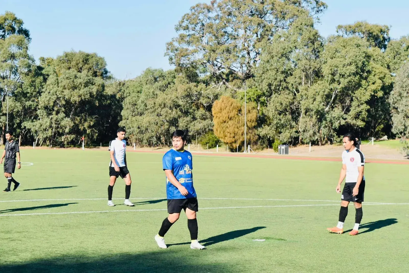 Young player running with the ball